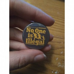 No One is Illegal badge pin...