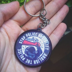 Stop police brutality, abolish the police keychain